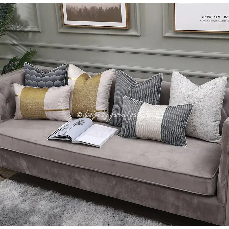 Set of six modern frosted gold satin pillow covers with gray silver metallic stripes and geometric decorbites design