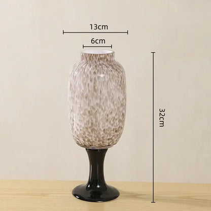 Frosted marbled dot texture glass vase in translucent beige with black glossy pedestal base for living room decorbites dot texture