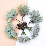 Frosted silver and brown decorative artificial plants bundle featuring artificial greenery with frosted leaves and dark acorns
