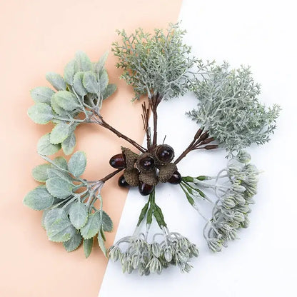 Frosted silver and brown decorative artificial plants bundle featuring artificial greenery with frosted leaves and dark acorns