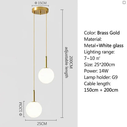 Brass gold pendant light with two frosted white and smoke gray glass globe shades suspended by adjustable chains