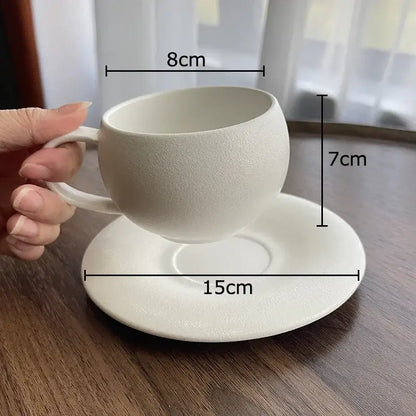 Minimalist frosted white textured ceramic cup and saucer set from DecorBites ideal for dining room use