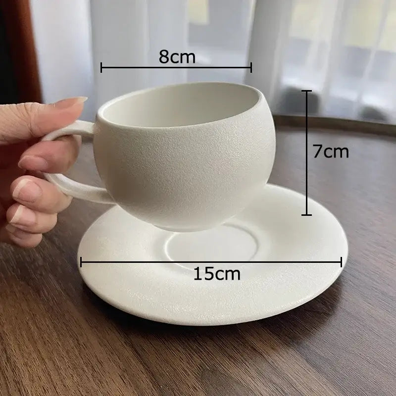 Minimalist frosted white textured ceramic cup and saucer set from DecorBites ideal for dining room use