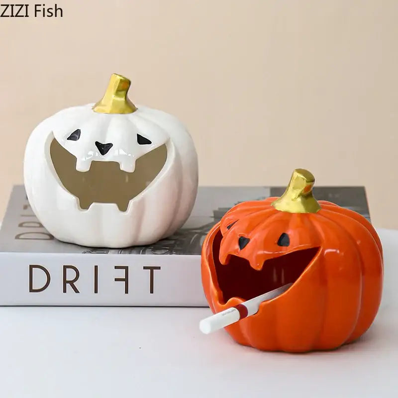 Funny orange ceramic halloween pumpkin ghost ashtray with gold stem and carved mouth holding a cigarette for office decor