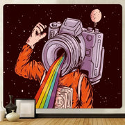 A vibrant orange futuristic astronaut tapestry wall hanging with a camera head and rainbow light on starry background