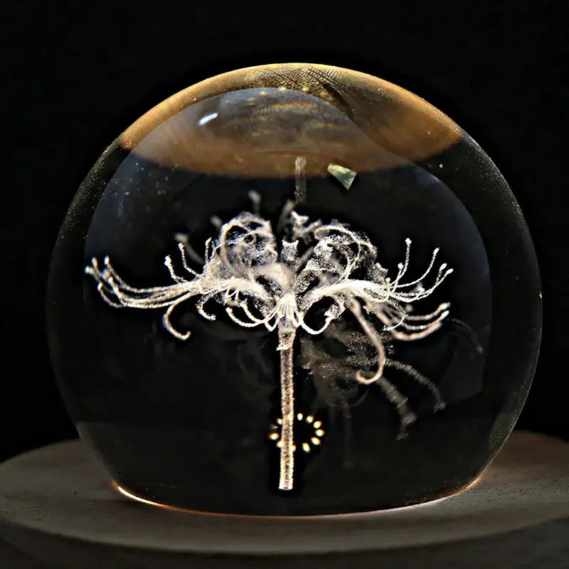 Galaxy crystal ball music box featuring a translucent resin orb with a detailed white flower inside rotating wooden base