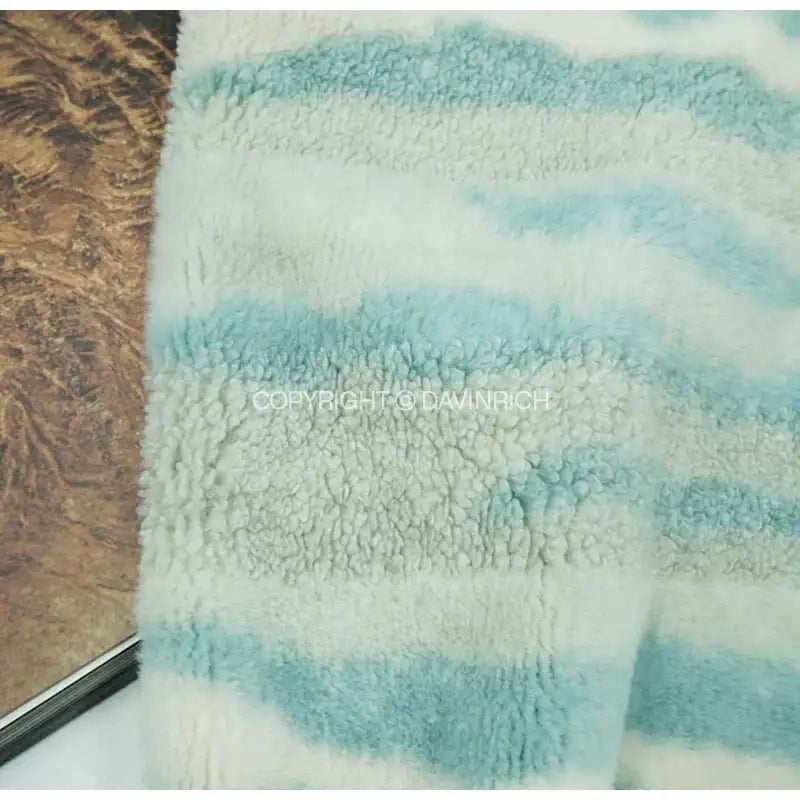 Soft plush fleece cushion covers with wavy light blue and off-white stripes galaxy inspired jupiter decorbites style