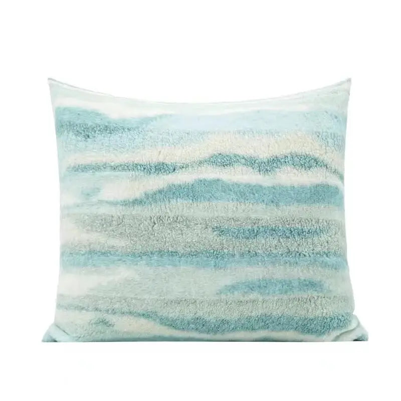 A plush square fleece cushion cover with soft textured horizontal stripes in teal and cream from decorbites galaxy inspired jupiter collection