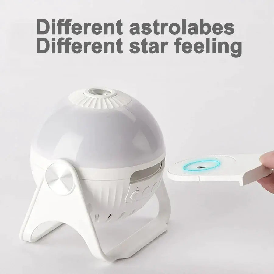 White plastic night light projector with sleek rounded dome and tripod base for galaxy planetarium bedroom gift