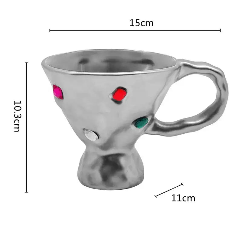 Silver metallic gemstone setting ceramic breakfast mug with textured sculpted body and colorful gemstone accents