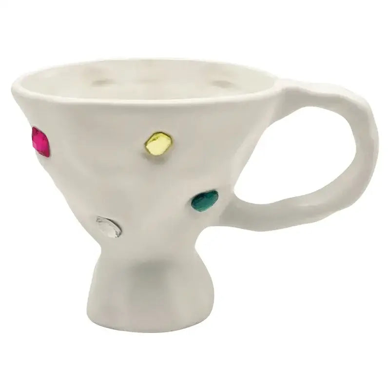 A white gemstone setting ceramic breakfast mug with textured body and colorful pink yellow green clear accents