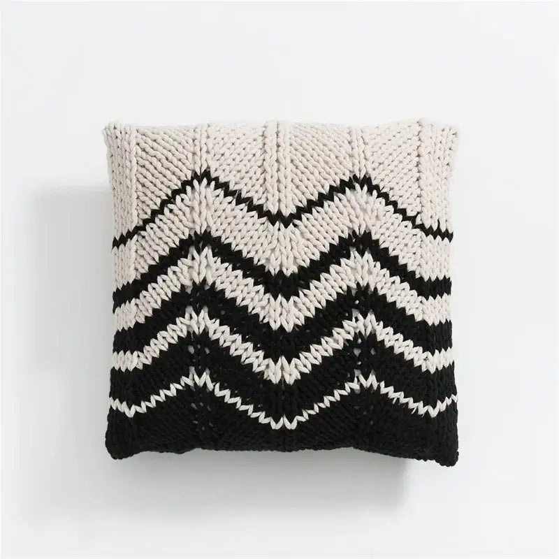 Cozy geo knit stripe black and ivory square pillow with bold zigzag pattern and textured chunky yarn for decorbites geo knit decor