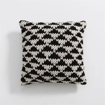 Black and white knitted square pillow with geo knit stripe zigzag pattern for decorbites geo knit decor