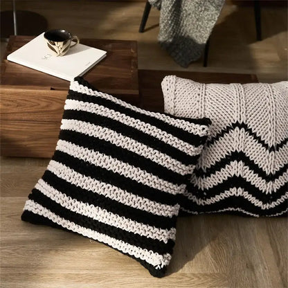 Black and white striped knitted geo knit stripe square pillow with chunky texture for bedroom decor by decorbites