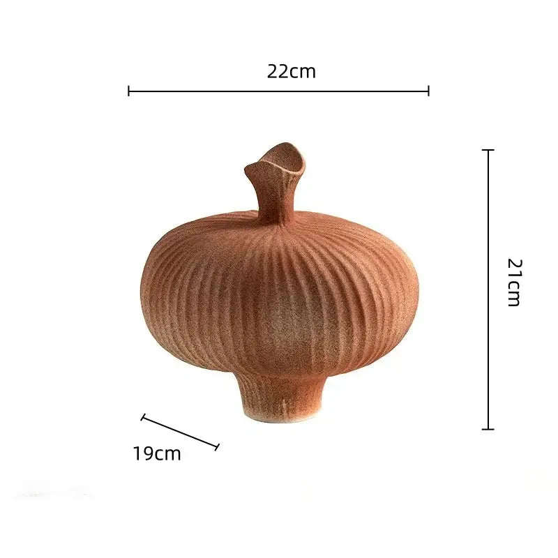 Terracotta-colored geometric abstract ceramic vase with vertical ridges and small flared neck for living room decorbites decor