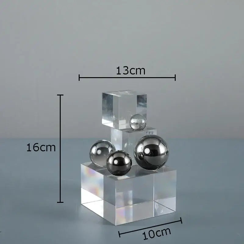 Clear acrylic cube desk ornament with stacked transparent bases and polished silver ball decorbites crystal ladder display