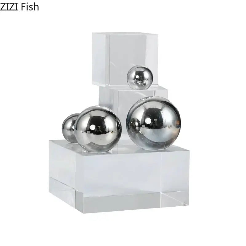 Shiny chrome silver ball desk ornament arranged on clear acrylic blocks geometric acrylic cube decorbites crystal ladder
