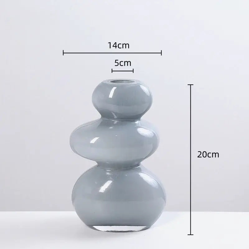 A sleek matte gray glass vase with a modern stacked design featuring three rounded tiers for stackable terrarium home decor by decorbites geometric glass