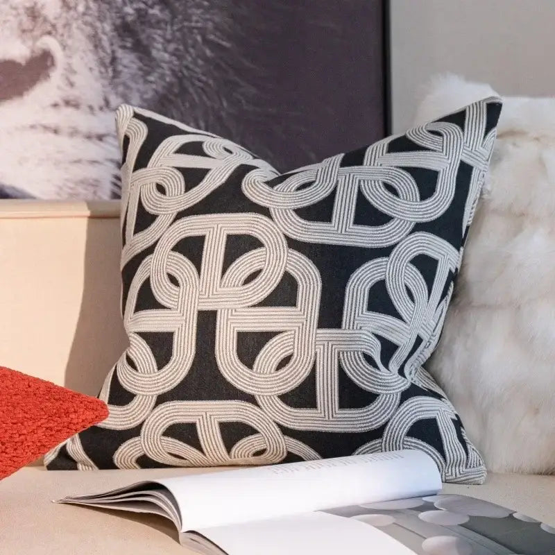 Geometric black and cream jacquard pillow cover set featuring intricate pattern for living room decor