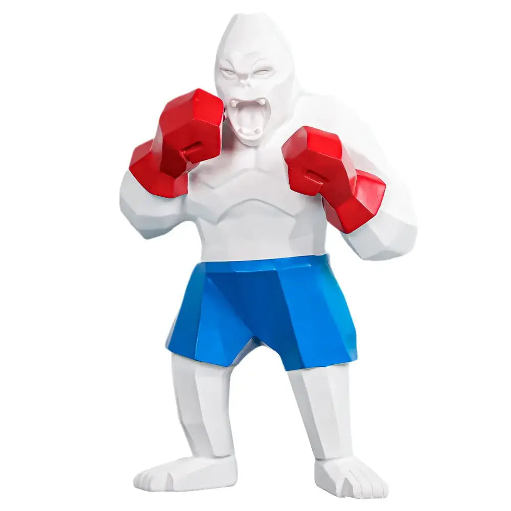White polygonal king kong gorilla sculpture wearing red boxing gloves and blue shorts for office decorbites king kong decor