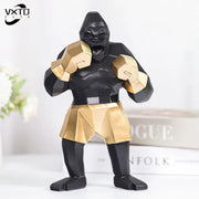 Geometric black and gold king kong gorilla sculpture with faceted design for office desk decor by decorbites