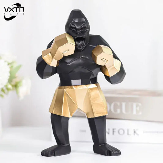 Geometric black and gold king kong gorilla sculpture with faceted design for office desk decor by decorbites