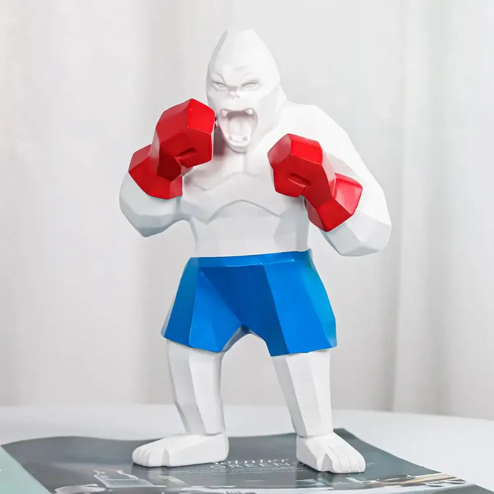 White geometric gorilla figurine with red boxing gloves and blue shorts for decorbites king kong sculpture desk decor