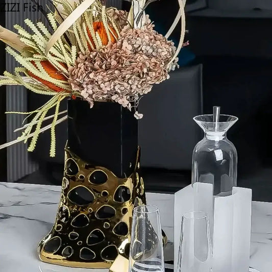 Black and gold plated hollowed vase with geometric perforated ceramic design for living room decorbites gold plated decor
