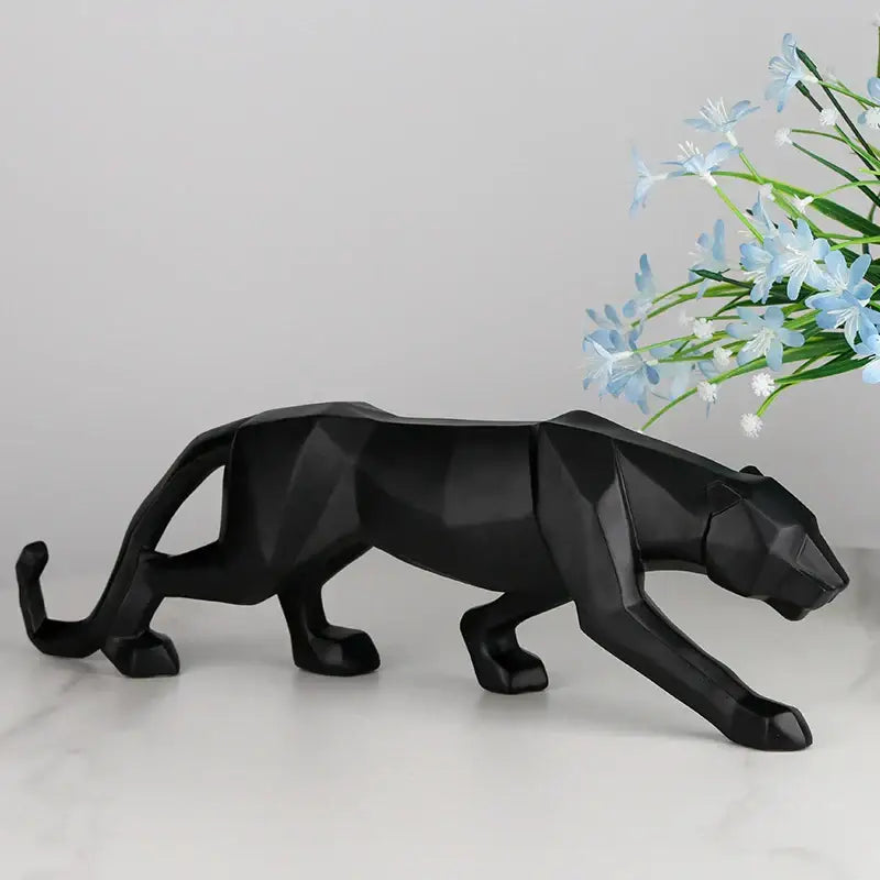 Geometric black panther resin statue with angular faceted design for living room decor by decorbites black panther