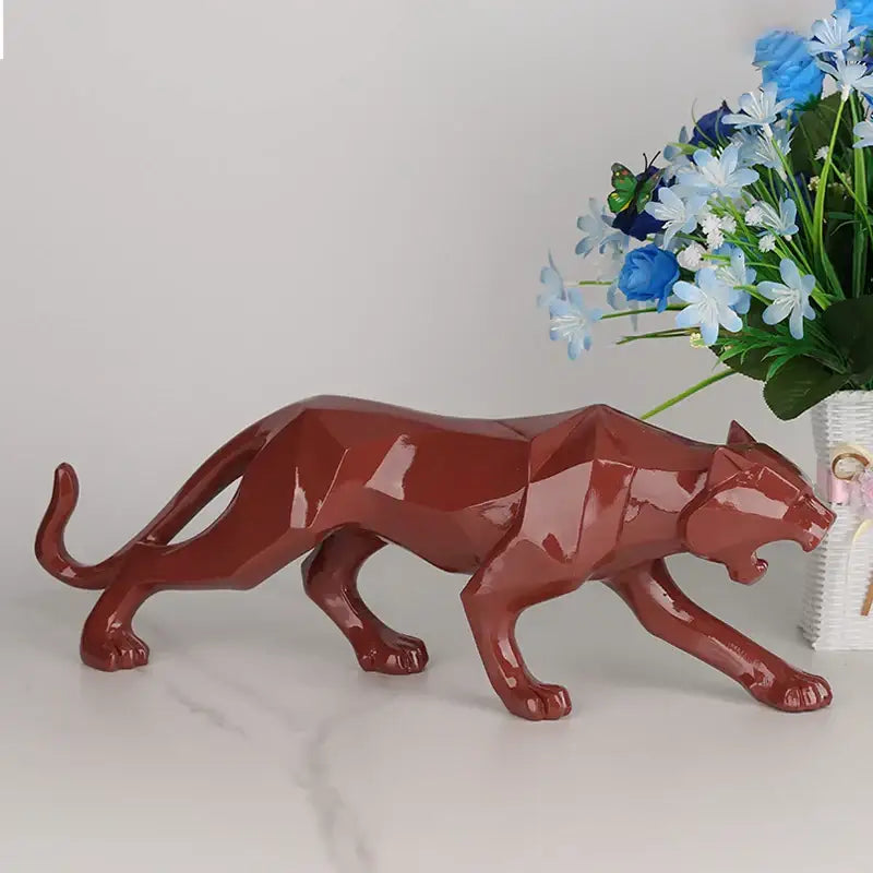 A glossy terracotta black panther resin geometric figurine with sharp facets for decorbites black panther living room decor