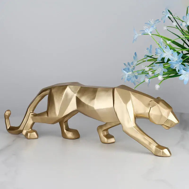 Gold-colored geometric black panther resin statue with modern stylized design for decorbites black panther living room decor