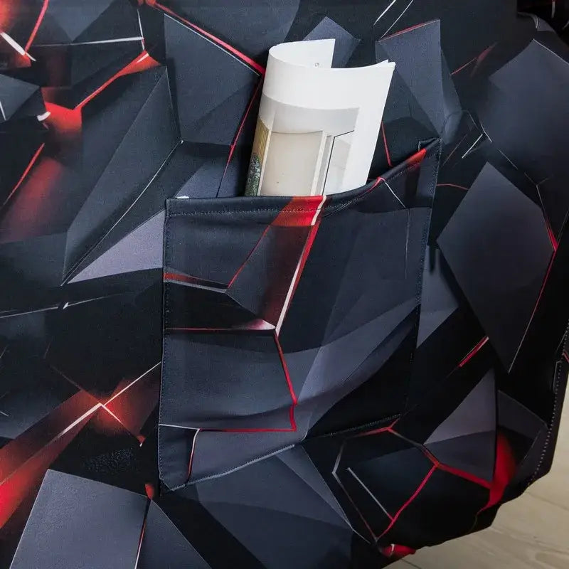 Geometric black and red stretch recliner cover with angular facets and vibrant crimson outlines for living room use