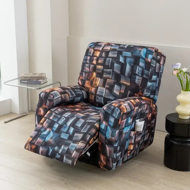 Recliner chair covered in a stretchy geometric-patterned fabric with shades of blue black and warm orange for living room