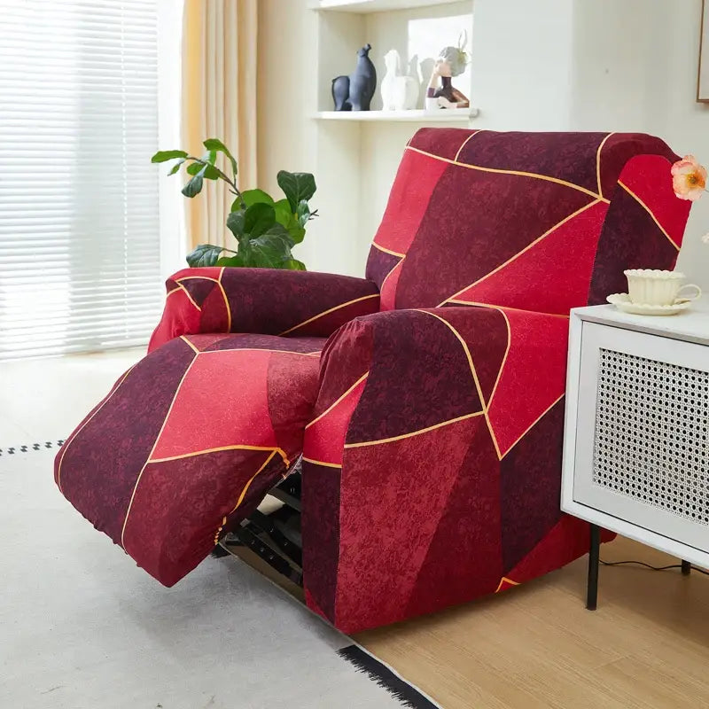 Geometric black and red stretch recliner cover featuring red and maroon patterns with gold trim for living room use