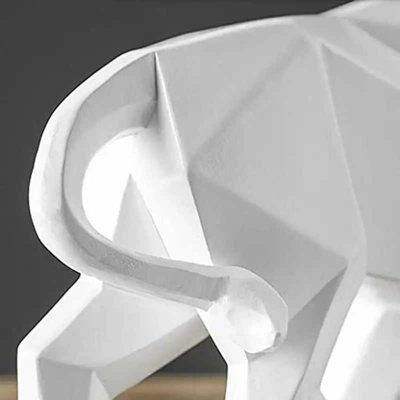 White geometric bull bison sculpture with angular faceted design perfect for modern living room decorbites decor
