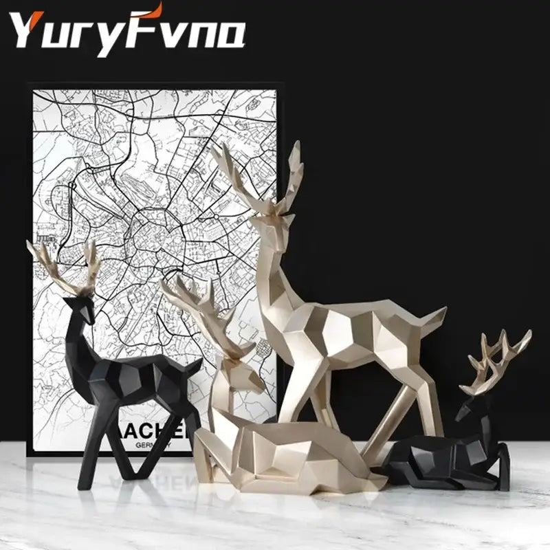 Set of three decorbites deer sculpture figurines in black and metallic gold with geometric angular facets for modern decor
