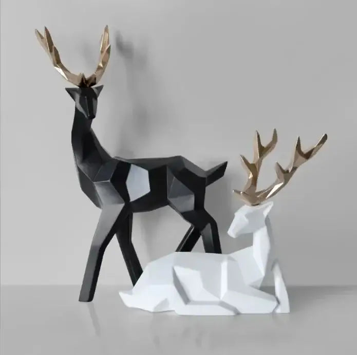 Geometric black and white deer sculpture with gold antlers for living room decor by decorbites deer sculpture