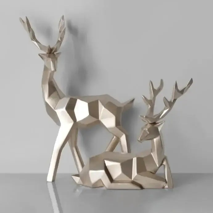 Two silver metallic geometric deer sculptures with gold antlers decorbites deer sculpture for living room decor