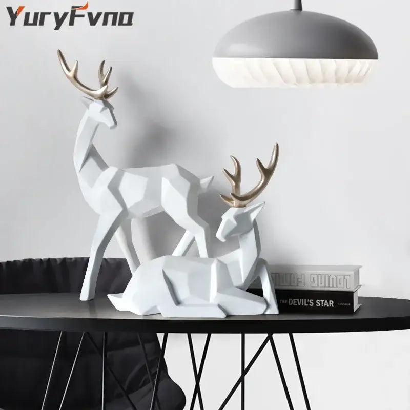 White and gold faceted decorbites deer sculpture with geometric design and gold antlers for living room decor