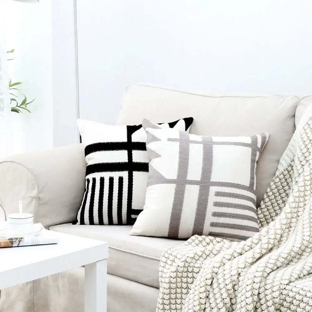 Two knitted throw pillows with geometric black and white embroidered burlap cushion covers for living room decorbites decor