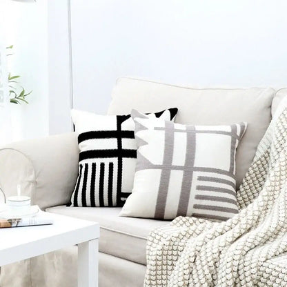 Two knitted throw pillows with geometric black and white embroidered burlap cushion covers for living room decorbites decor