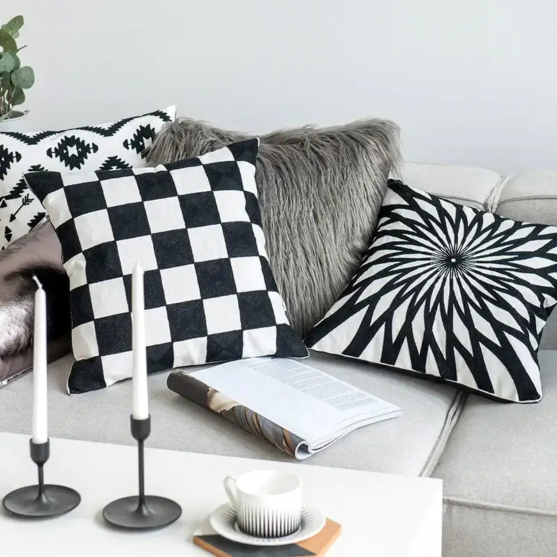 Geometric black and white embroidered cushion cover with a textured faux suede finish for living room decorbites decor