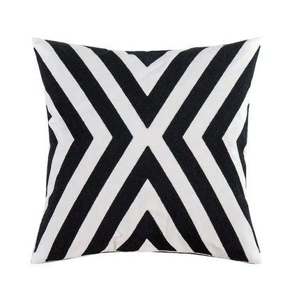 Black and white embroidered cushion cover with bold diagonal stripes forming an x design for living room decorbites decor
