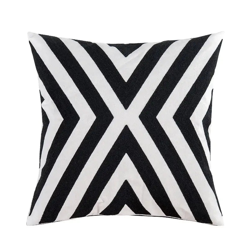 Black and white embroidered cushion cover with bold diagonal stripes forming an x design for living room decorbites decor
