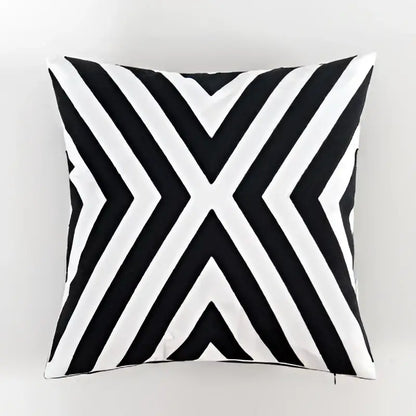 Geometric black and white embroidered cushion cover with bold diagonal stripes forming an x design for living room decorbites black white