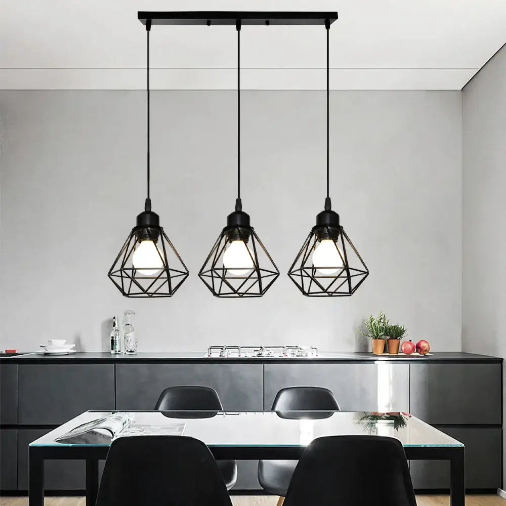 Black geometric iron frame pendant chandelier with modern industrial design hangs above the dining table decorbites iron frame