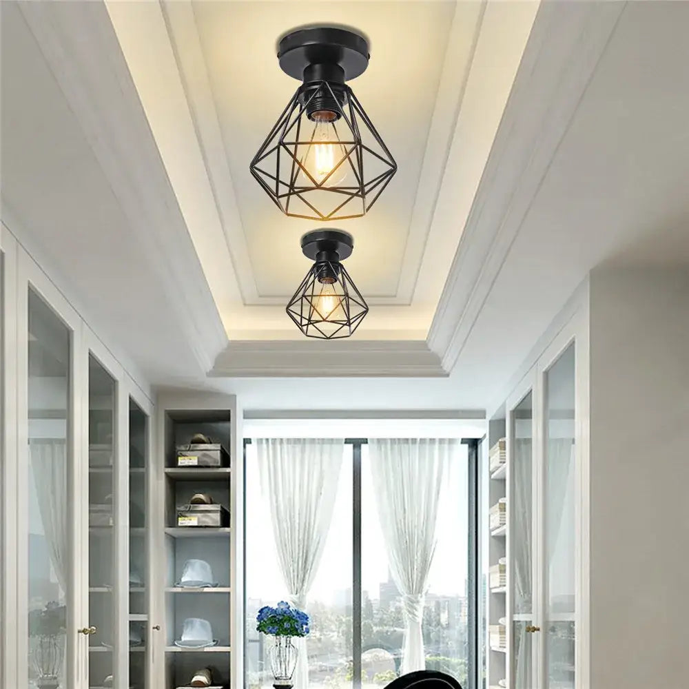 Geometric black iron frame pendant chandelier with exposed filament bulbs for dining room decorbites iron frame decor