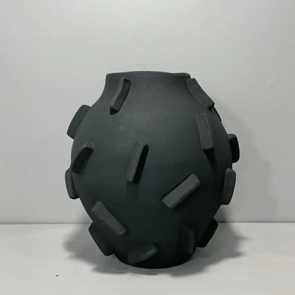 Black ceramic geometric block ceramic vase with rounded body and protruding rectangular ridges for living room decorbites decor