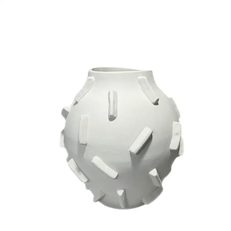 White ceramic geometric block vase with rounded body and rectangular ridges for decorbites geometric block decor