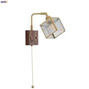 Geometric blue glass and brass led wall light with wood accent for dining room decorbites brass led wall sconce